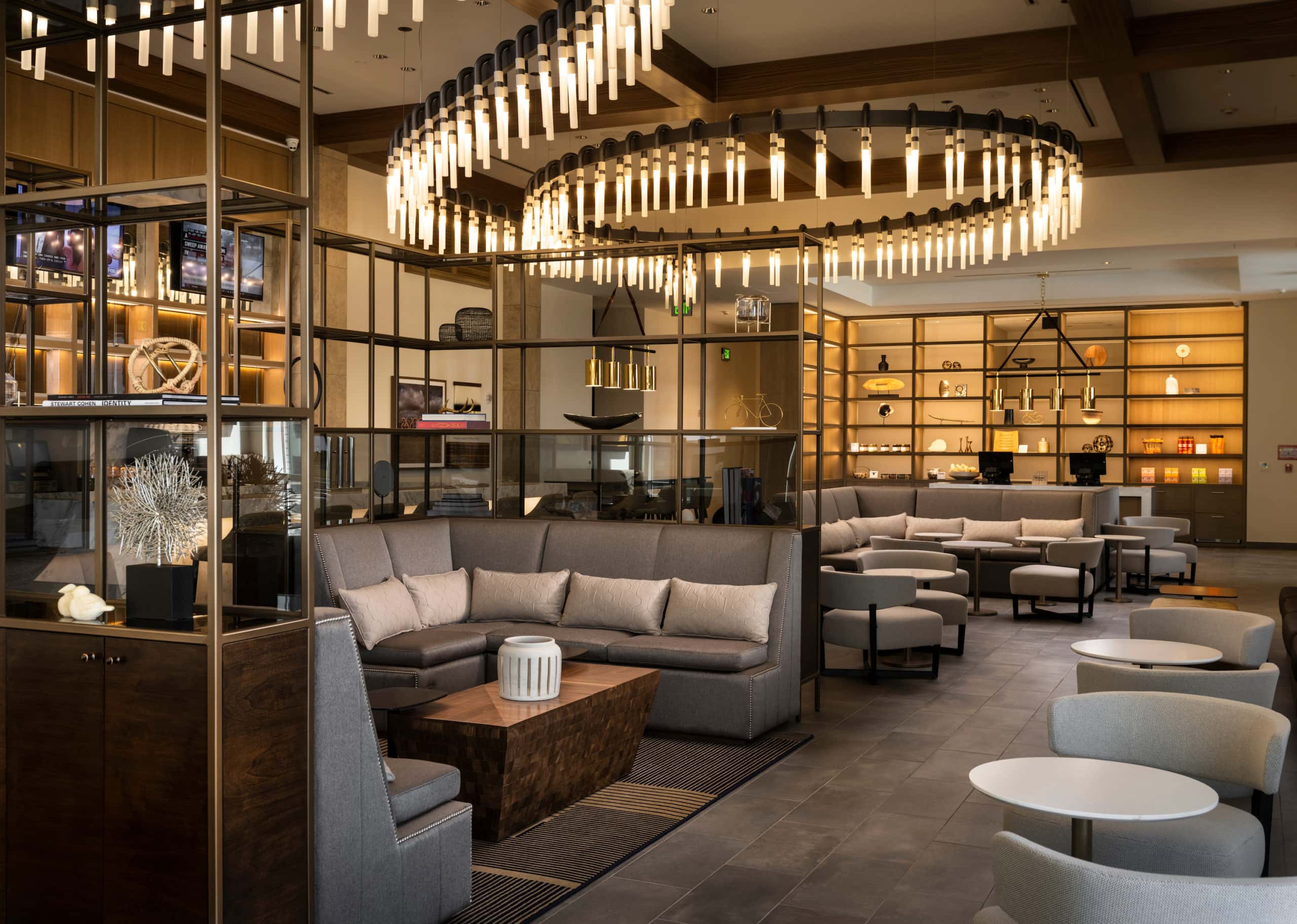 Contemporary hotel lobby with warm wood finishes